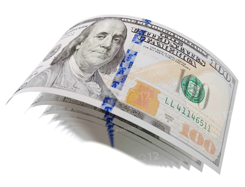 Abstract set of U.S. 100 dollar bills isolated on a white background