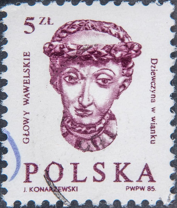 Wawel Head – Renaissance sculptures of wooden heads adorning the ceiling of the Ambassadors' Hall at the Wawel Royal Castle in Krakow. The ceiling's significance is allegorical, with the heads representing figures of various social standing, such as kings, soldiers, and courtiers. Portrait on Polish postage stamp