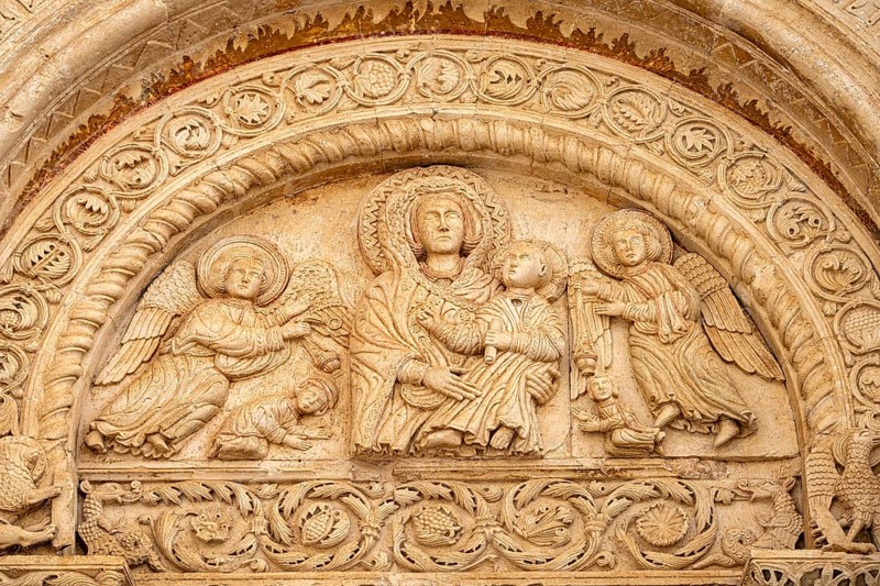 Relief above the portal of the church of Santa Maria Maggiore in Monte Sant'Angelo, Gargano, Apulia, Italy