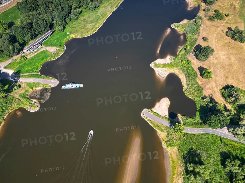 DefaultAerial view, Elbe, yaw ferry, shipping, reed bed, ferry connection, ferry, foggy mood, sunrise, biotope, habitat, motorboat, holiday destination, Germany from above, sandbanks, dryness, low water, drought, climate change, Elbe cycle path, tourism, Elbe floodplains, floodplain landscape, river course, delta, Middle Elbe river landscape, flowing water, sunrise, Middle Elbe biosphere reserve, Saxony-Anhalt, Germany