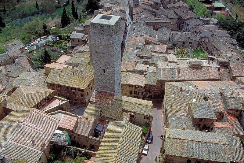 Roofscape and a gender tower of San Gimignano, Toakana, Italy