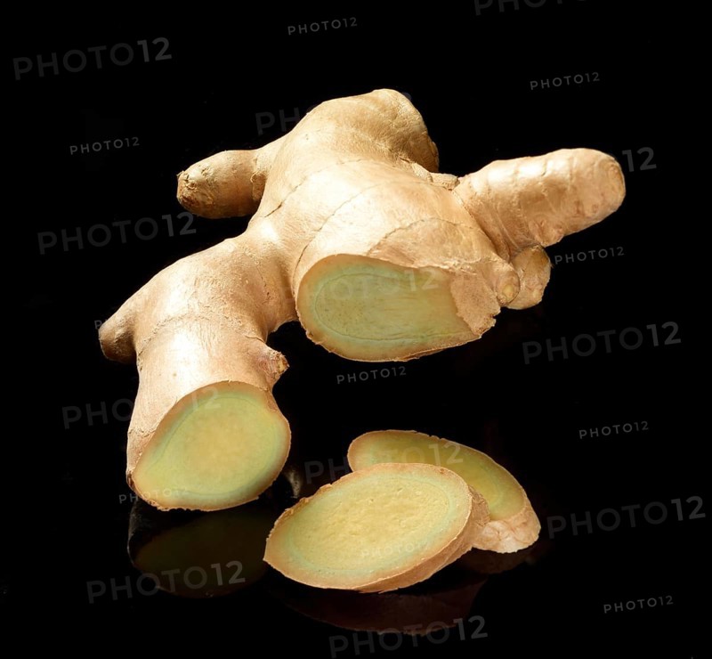 Ginger (Zingiber officinale) against a black background