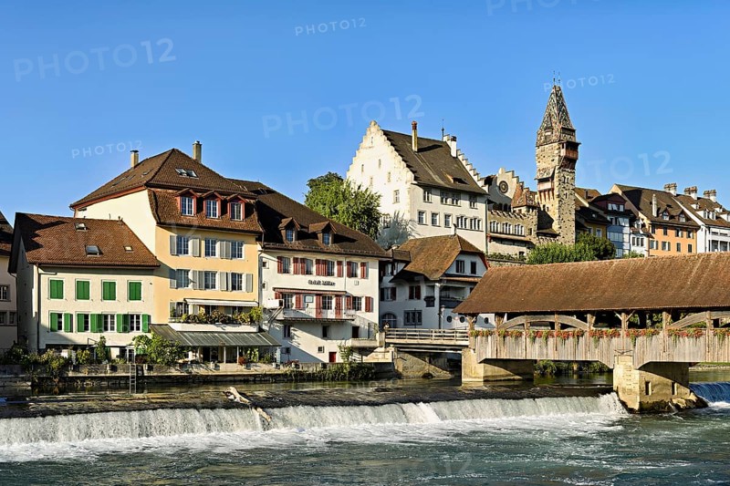 Old town with the tower of the Muri- Amthof, in the foreground the weir, the old wooden bridge over the river Reuss, Bremgarten, Freiamt, Canton, Aargau, Switzerland
