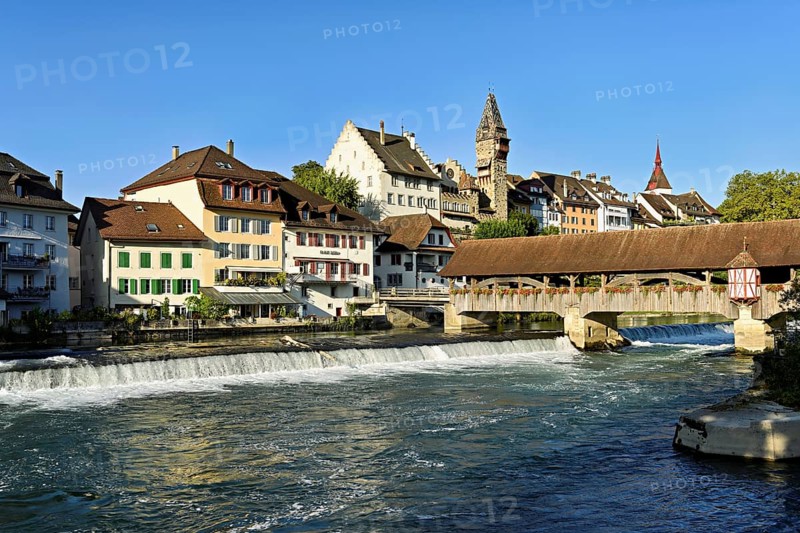 Old town with the tower of the Muri- Amthof, in the foreground the weir, the old wooden bridge over the river Reuss, Bremgarten, Freiamt, Canton, Aargau, Switzerland