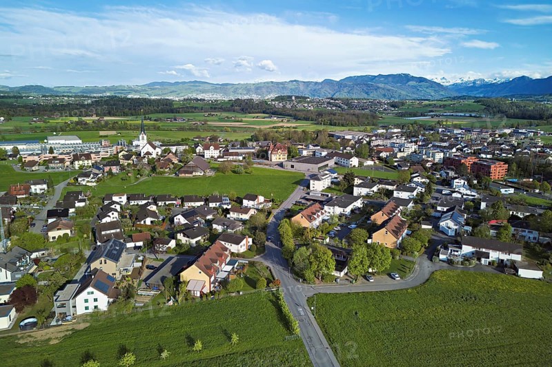 View of the village with the neighbourhood Oberdorf and the catholic parish church Mariä Geburt, Sins, Freiamt, Canton, Aargau, Switzerland