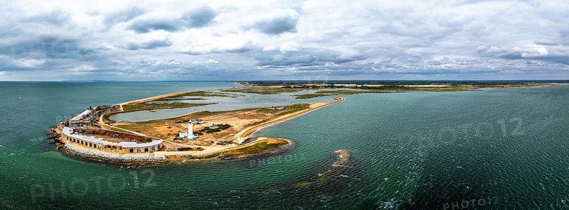 Panorama of Hurst Point Lighthouse and Hurst Castle from drone over Hurst Spit, Milford on Sea, Lymington, Hampshire, England, United Kingdom