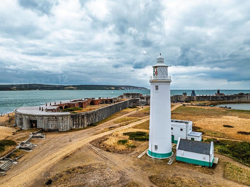 Hurst Point Lighthouse and Hurst Castle from drone over Hurst Spit, Milford on Sea, Lymington, Hampshire, England, United Kingdom