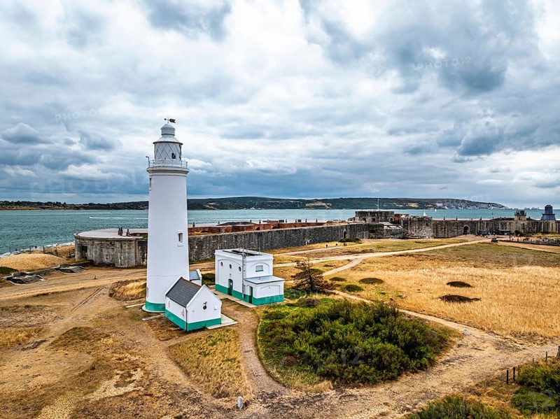 Hurst Point Lighthouse and Hurst Castle from drone over Hurst Spit, Milford on Sea, Lymington, Hampshire, England, United Kingdom