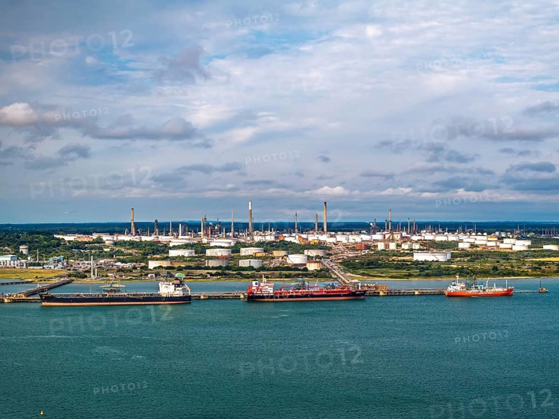 Gas tankers over refinery Esso Oil Terminal from drone, Southampton, Hampshire, England, United Kingdom