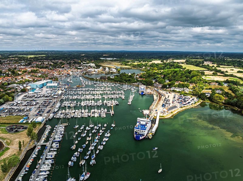 Wight Light car ferry to Isle of Wight on Lymington River and marina from drone, Lymington, New Forest, Hampshire, England, United Kingdom
