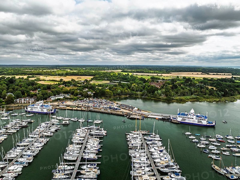 Wight Light car ferry to Isle of Wight on Lymington River and marina from drone, Lymington, New Forest, Hampshire, England, United Kingdom