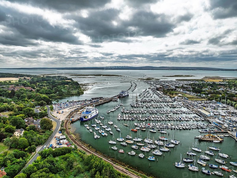 Wight Light car ferry to Isle of Wight on Lymington River and marina from drone, Lymington, New Forest, Hampshire, England, United Kingdom