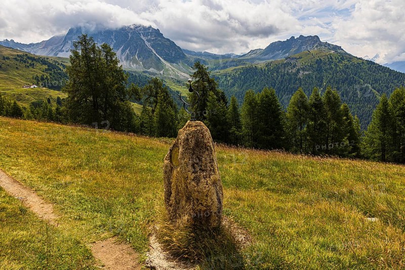 Planetary path, here the motif stone for the planet Mercury, above Saint Luc, Val d'Anniviers, Valais Alps, Canton Valais, Switzerland
