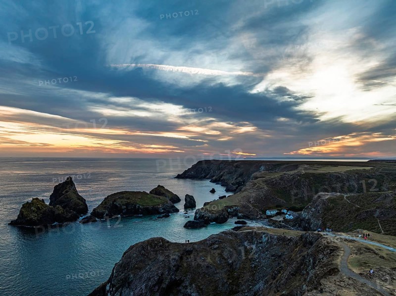 Sunset over Kynance Cove from a drone, Mount's Bay, Lizard Point, Cornwall, England, United Kingdom