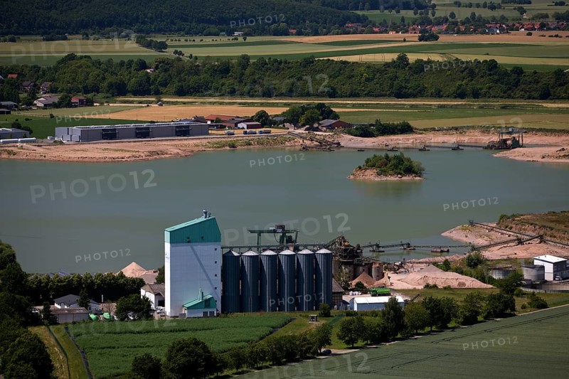 Elevated view of the Ernst Müller GmbH & Co KG gravel works from Eckberg, Bodenwerder, Weserbergland, Lower Saxony, Germany