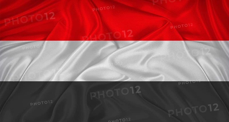 Flag of Yemen with cloth texture. Close up of Yemen flag waving