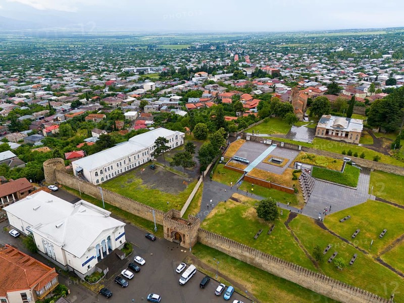 Historic walls and buildings with neighbouring trees in an urban environment, aerial view, bank building, school, museum and royal palace, Batonis Ziche, Batonistsikhe, royal fortress, Telavi, Telavi, Kakheti region, Georgia