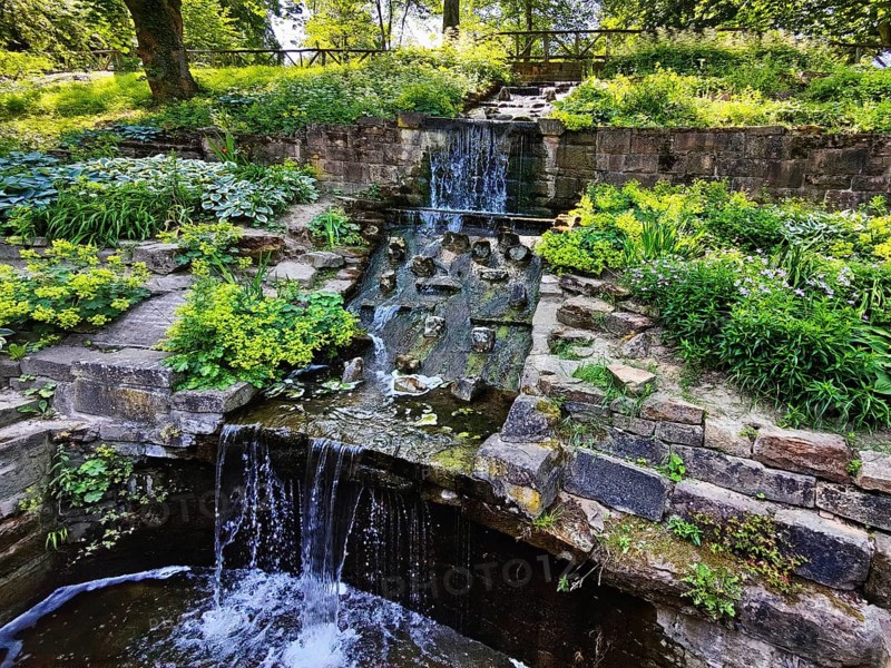 Small waterfall in the park, Nördlicher Park, Bad Nauheim, Hesse, Germany