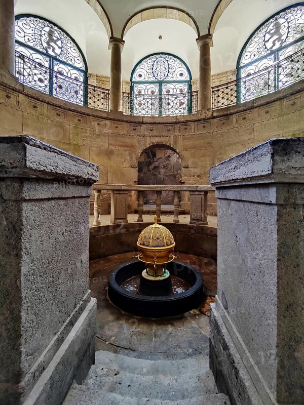 Sacred atmosphere, spa fountain in the fountain temple of the drinking spa complex, healing spring emerging from the golden ball, Bad Nauheim, Hesse, Germany