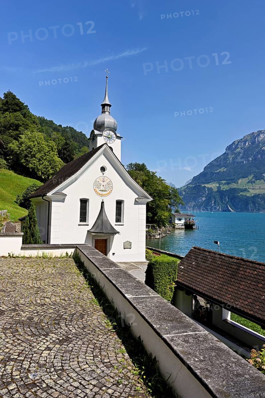 Roman Catholic Church of St Idda, Lake Lucerne in the background, Bauen, Canton, Uri, Switzerland