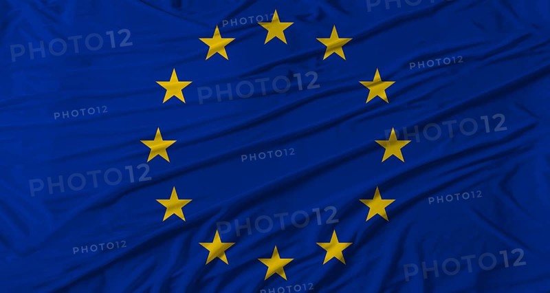 Close up of European Union flag waving. Flag of European Union with cloth texture