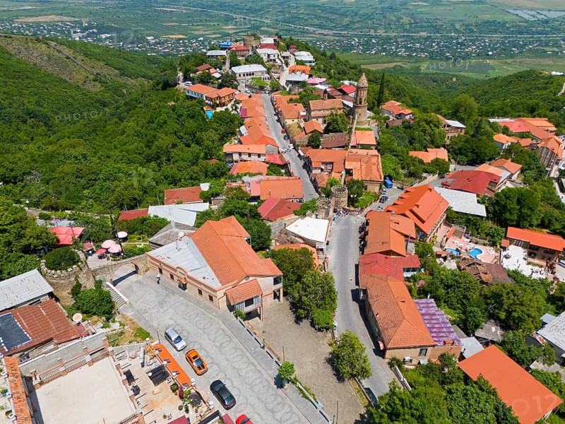 Hilly street view with traditional buildings and panoramic distant view, aerial view, Sighnaghi, Signagi, Kakheti Province, Greater Caucasus, Georgia, Near East