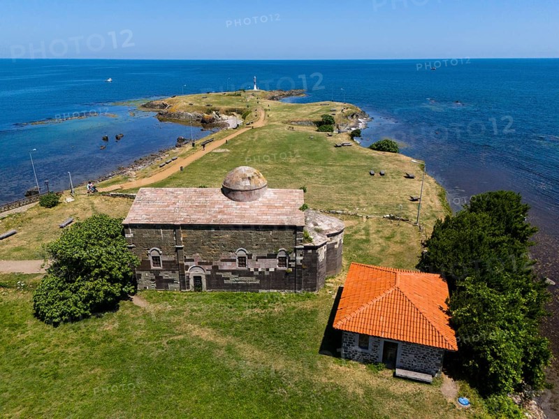 Aerial view of a historic church on the coast with neighbouring building and wide sea horizon, aerial view, Yason church, Yason Burnu lighthouse, Cape Jason, Çaytepe, Ordu province, Turkey