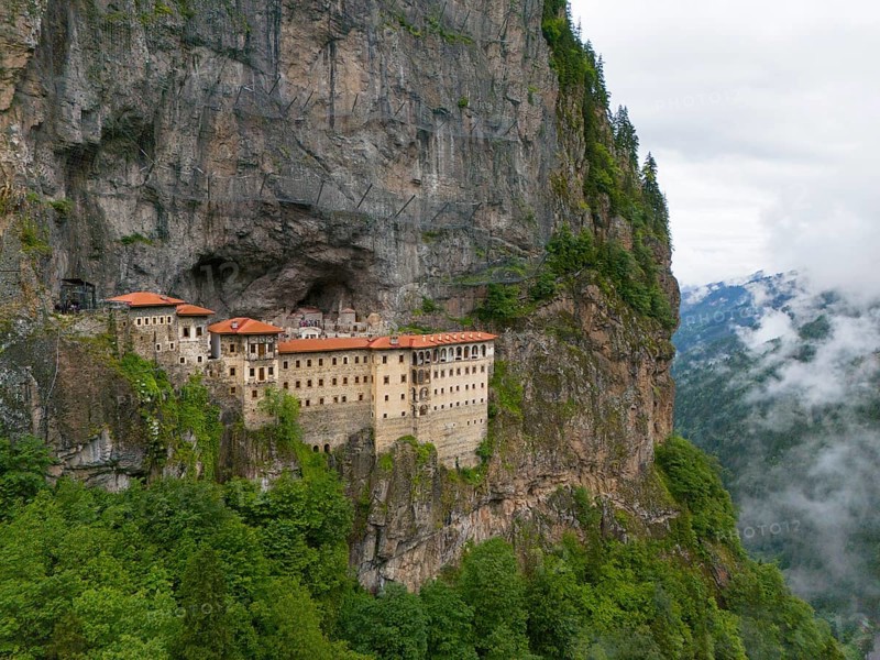 A mystical monastery in a misty rocky landscape, high above the green surroundings, aerial view, Sumela Monastery, Sümela Manastiri, Maçka, Macka, Trabzon Province, Turkey