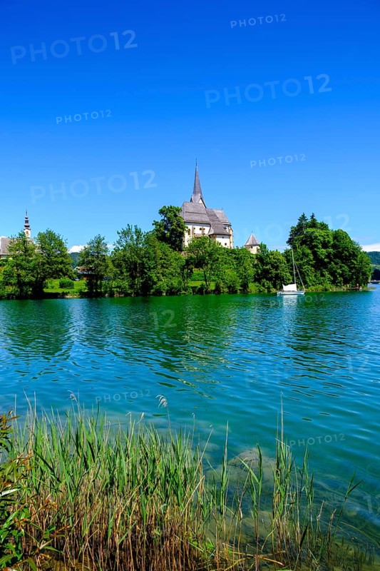 Maria Wörth pilgrimage church, on the southern shore of Lake Lake Wörth, Carinthia, Austria