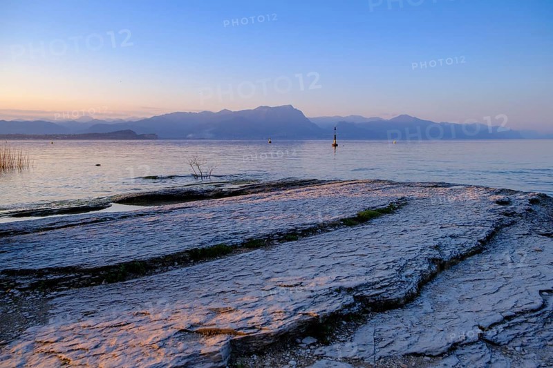 Sunset at Lido delle Grotte, Jamaica Beach, Sirmione on Lake Garda, Veneto, Veneto, Italy