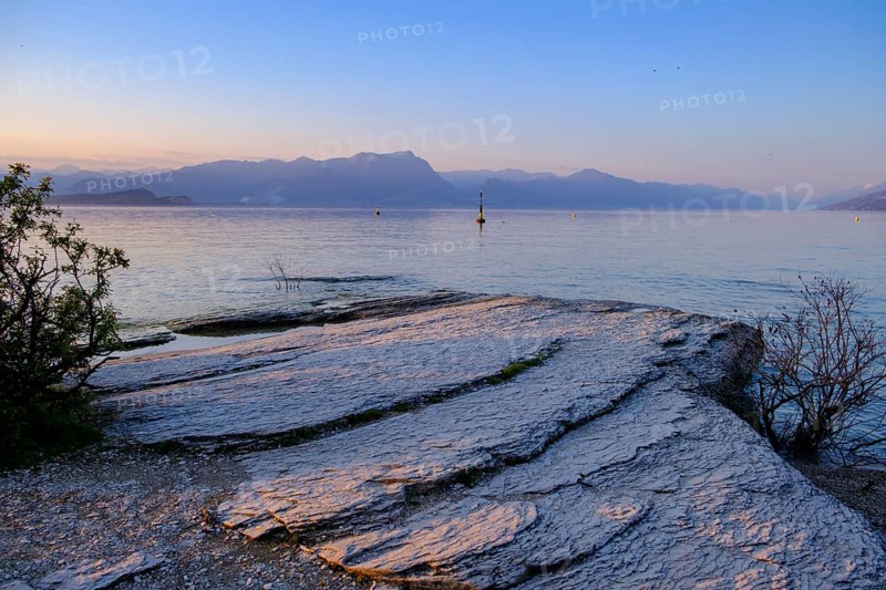 Sunset at Lido delle Grotte, Jamaica Beach, Sirmione on Lake Garda, Veneto, Veneto, Italy