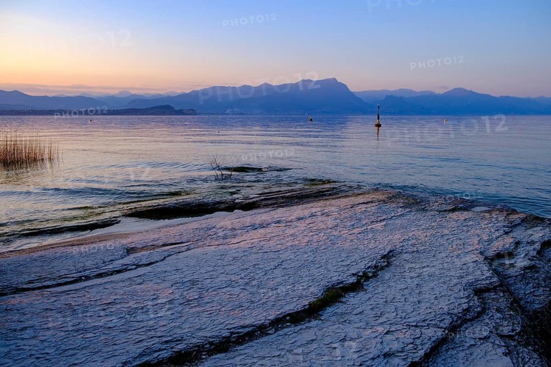 Sunset at Lido delle Grotte, Jamaica Beach, Sirmione on Lake Garda, Veneto, Veneto, Italy