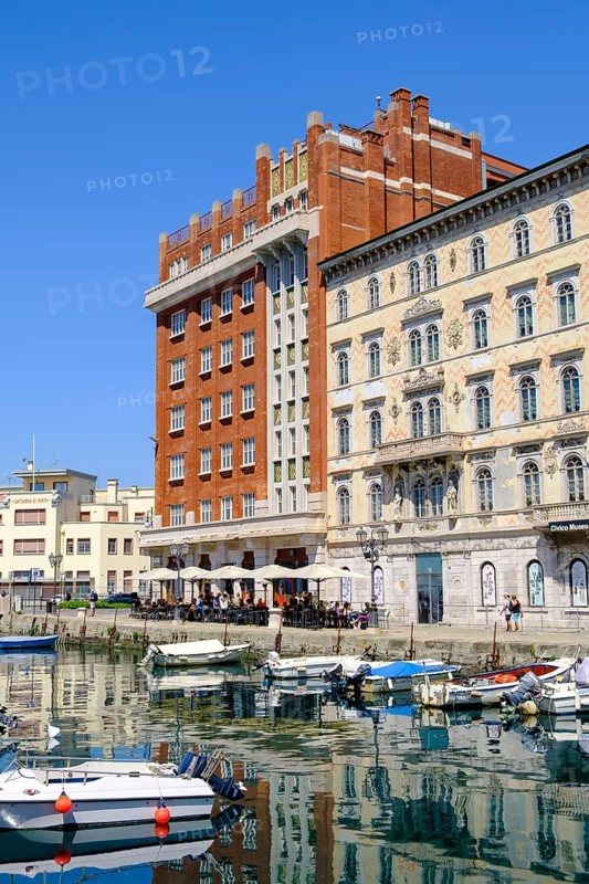 Commercial and residential buildings on the Grand Canal, Borgo Teresiano, Trieste, Adriatic Sea, Julian Friuli, Italy
