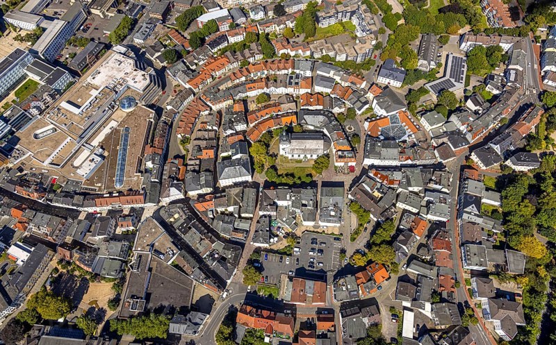 Aerial view, circular residential complex in the city centre with evang. Erlöserkirche, Corneliusstrasse and Grabenstrasse, Lüdenscheid city, Lüdenscheid, Sauerland, North Rhine-Westphalia, Germany, place of worship, DE, Europe, religious community, place of worship, property tax, holy place, real estate, church, parish, denomination, aerial view, aerial photography, aerial photography, Märkischer Kreis, religion, religious site, overview, bird's-eye view, residential area, living and life, residential area, quality of life, residential neighbourhood, housing estate, residential district, birds-eyes view, overview