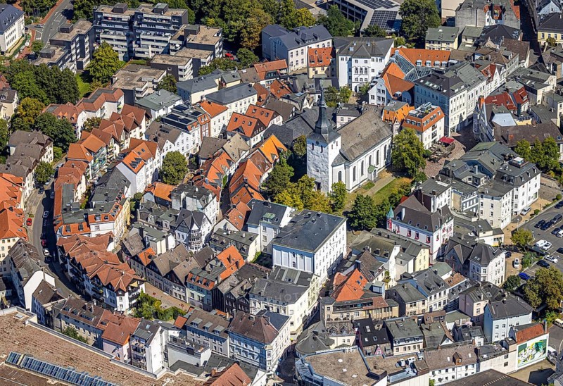 Aerial view, circular residential complex in the city centre with evang. Erlöserkirche, Corneliusstrasse and Grabenstrasse, Lüdenscheid city, Lüdenscheid, Sauerland, North Rhine-Westphalia, Germany, place of worship, DE, Europe, religious community, place of worship, property tax, holy place, real estate, church, parish, denomination, aerial view, aerial photography, aerial photography, Märkischer Kreis, religion, religious site, overview, bird's-eye view, residential area, living and life, residential area, quality of life, residential neighbourhood, housing estate, residential district, birds-eyes view, overview