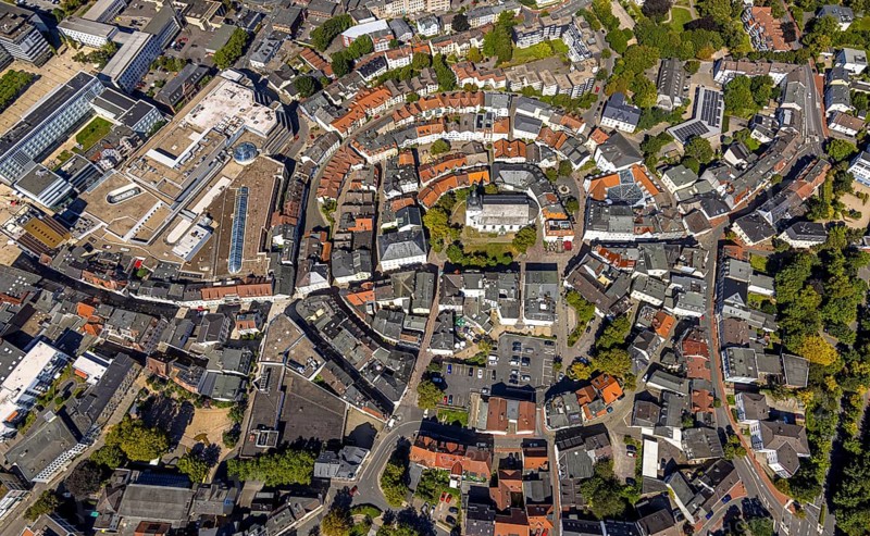 Aerial view, circular residential complex in the city centre with evang. Erlöserkirche, Corneliusstrasse and Grabenstrasse, Lüdenscheid city, Lüdenscheid, Sauerland, North Rhine-Westphalia, Germany, place of worship, DE, Europe, religious community, place of worship, property tax, holy place, real estate, church, parish, denomination, aerial view, aerial photography, aerial photography, Märkischer Kreis, religion, religious site, overview, bird's-eye view, residential area, living and life, residential area, quality of life, residential neighbourhood, housing estate, residential district, birds-eyes view, overview