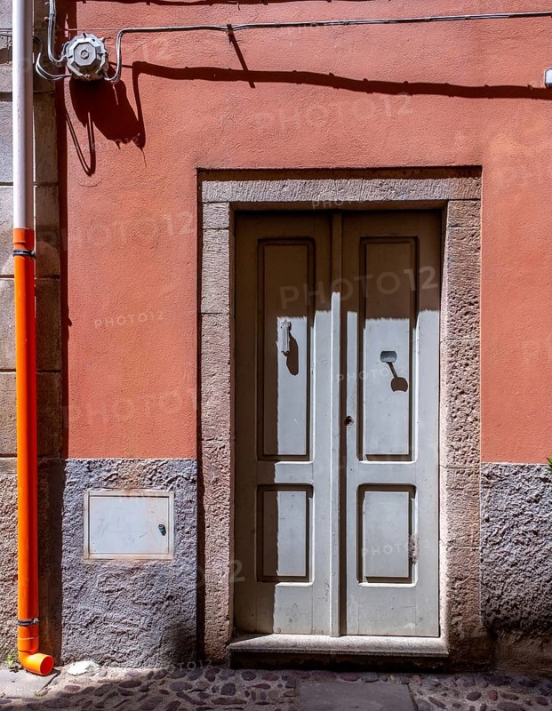 Sardinia, house with picturesque door, Bosa, Europe, Province of Oristano, Italy, old, architecture, detail, entrance, colours, facade, window, building, house, culture, travel, sightseeing, summer, sun, town, street, urban, daylight, tourism, urban, residential, charming, decorative, historic, picturesque, picturesque town, picturesque door, Mediterranean, picturesque, southern European, traditional