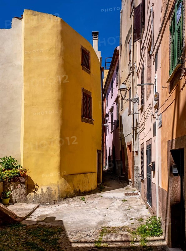 Sardinia, alley with picturesque house and window, Bosa, Europe, Oristano province, Italy, old town, antique, architecture, atmosphere, exterior, flowers, detail, village, conservation, colours, facade, window, shutters, photography, alley, building, house, sky, cobblestone, culture, travel, sightseeing, sun, alleyway, scenery, daylight, tourism, holiday, charming, decoration, narrow, historical, picturesque, mediterranean, traditional
