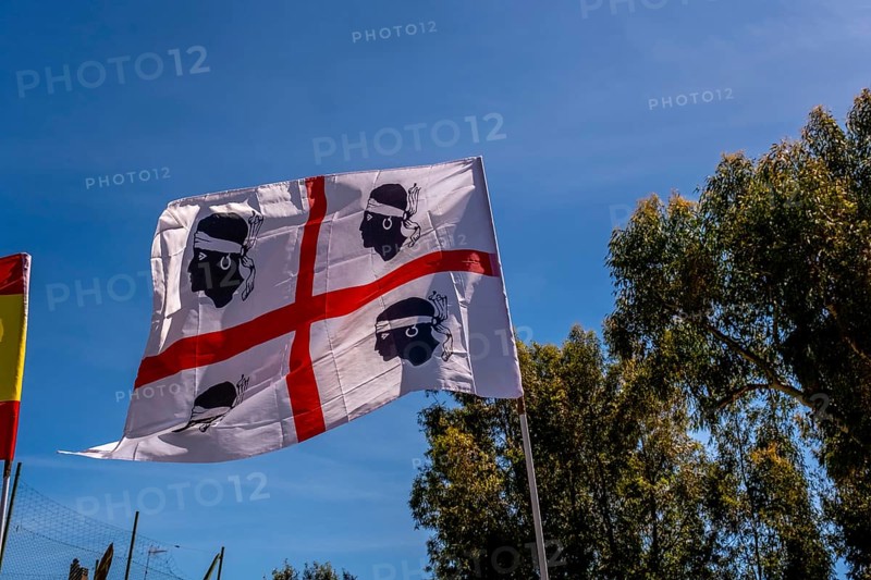Sardinia, Sardinian flag, white flag with red cross and four Moorish heads, Bosa, Europe, Province of Oristano, Italy, emblem, flag science, history, heraldry, identity, island, insignia, culture, nationality, Sarkes, sightseeing, significance, state symbol, symbol, tourism, tradition, Italian culture, distinctive, Mediterranean, Mediterranean region, regional, red cross, four Moorish heads, white flag