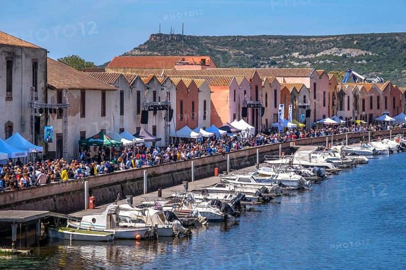 Sardinia, boats in the river Temo and houses on the promenade, guests at the restaurants with outdoor catering, Bosa, Europe, province of Oristano, Italy, old town, architecture, outdoor catering, boats, relaxation, recreation, food, river Temo, river promenade, riverside, leisure, spring, building, guests, people, promenade, travel, restaurants, sightseeing, summer, sunlight, town, pavement cafés, day, tourism, drinking, shore, holiday, water, residential, historic, picturesque, Mediterranean, traditional