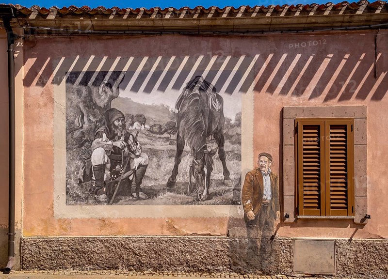 Sardinia, house with murals, Sardinian landmark, Tinnura, Europe, Oristano province, Italy, architecture, exterior, exterior, charm, detail, village, heritage, colours, facade, building, history, house, culture, art, artist, murals, travel photography, landmark, sightseeing, symbolism, tourism, mural, attractive, decoration, historical, creative, artistic, rural, picturesque, Mediterranean, regional, traditional