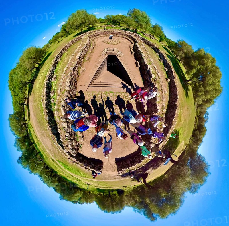Sardinia, fisheye shot of a tourist group at a Roman bathing complex, Paulilatino, Europe, Oristano province, Italy, architecture, archaeology, recording, excursion, outdoor, building, sightseeing, arch, exploration, guided tour, history, culture, dome, perspective, travel, ruins, Roman bathing complex, sightseeing, summer, stone, structure, tourism, tourist, tourist group, holiday, wide angle, antique, adult, fisheye, historical site, international
