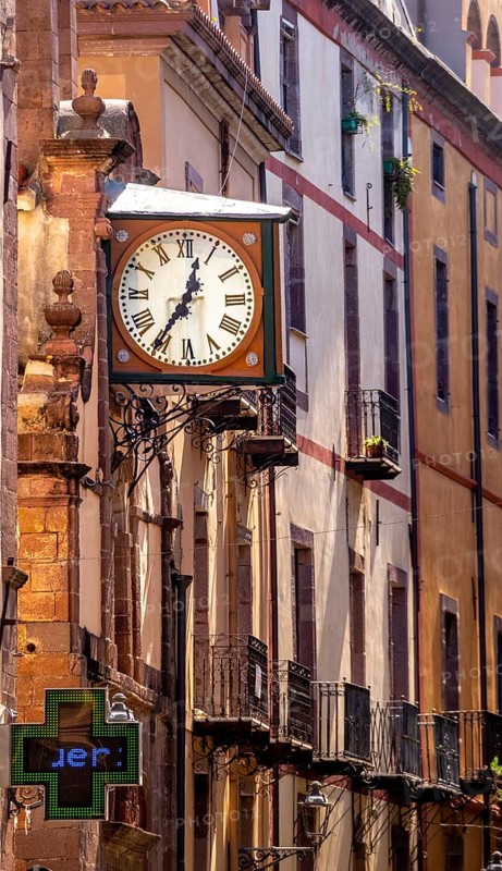 Sardinia, historical clock on a house wall, Bosa, Europe, Province of Oristano, Italy, old town, architecture, attraction, outdoor, detail, exploration, facade, building, history, house wall, travel destination, sightseeing, summer, city view, street, day, tourism, tradition, clockwork, urban, landmark, timekeeping, clock face, old building, antique, charming, decoration, historical architecture, historical clock, Italian, cultural, picturesque, Mediterranean, stone