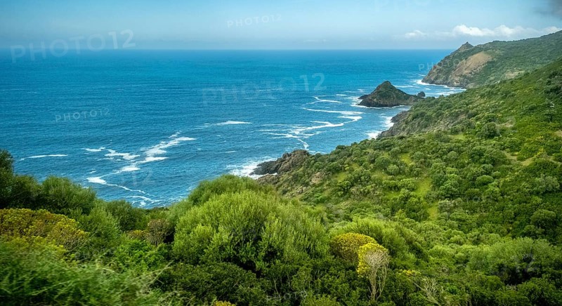 Sardinia, Mountainous coastal landscape by the sea, blue sky with clouds, Bosa, Europe, Province of Oristano, Italy, view, mountains, mountainous coastal landscape, elevation, rocks, rock formations, photography, sky, idyll, coast, coastline, landscape, sea, Mediterranean, Mediterranean region, nature, panorama, regionality, travel, sights, sightseeing, summer, south, daylight, tourism, holiday, water, clouds, cloudy, blue sky, peaceful, picturesque, Mediterranean