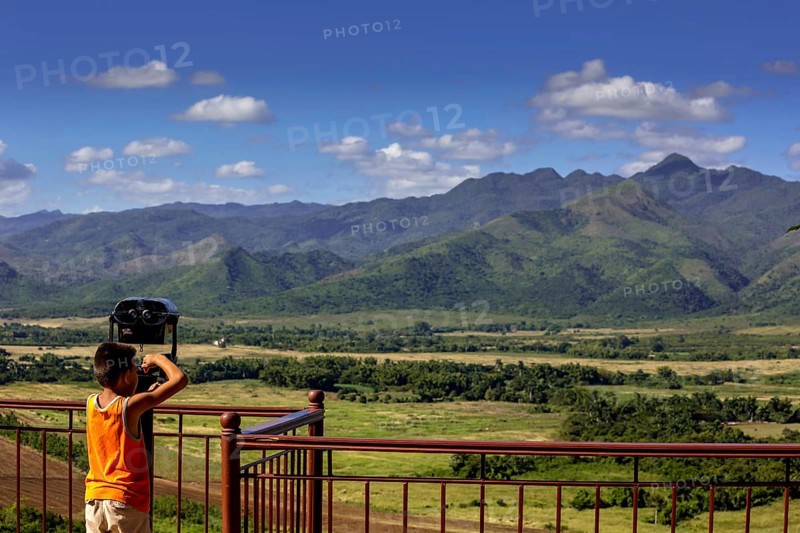 Mirador, Viewpoint over the valley of Ingenios, Valle de los Ingenios with little boy and binoculars, Cuba, Sancti Spíritus, Sancti Spíritus