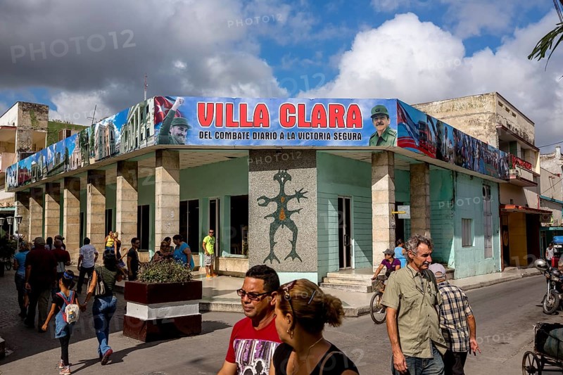 Comandante Fidel Castro on a poster in the city centre, Streetlife in the city centre of Santa Clara at the Parque de Santa Clara, Santa Clara, Cuba, Villa Clara