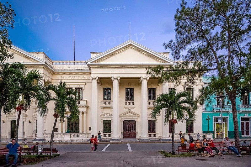 Neoclassical Marti Library in the centre of Santa Clara, Biblioteca Marti, Streetlife in the city centre of Santa Clara at the Parque de Santa Clara, Santa Clara, Cuba, Villa Clara