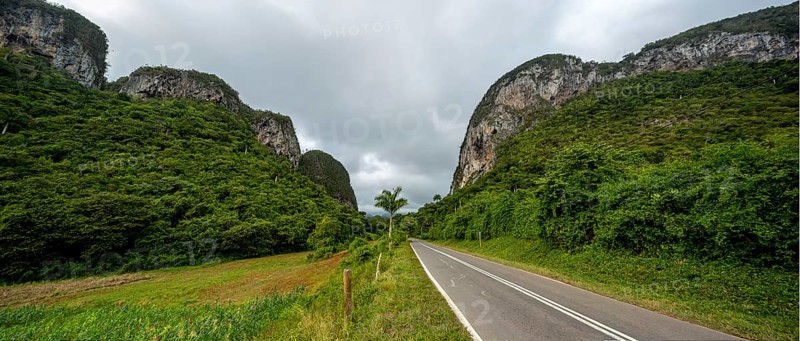 Country road with central reservation in the Vinales Valley, Viñales, Cuba, Pinar del Río, Cuba