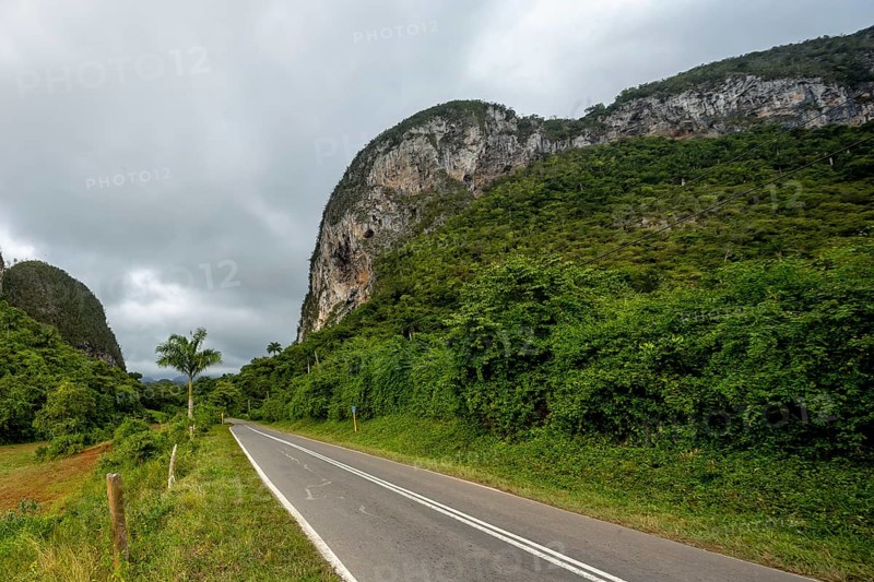 Country road with central reservation in the Vinales Valley, Viñales, Cuba, Pinar del Río, Cuba