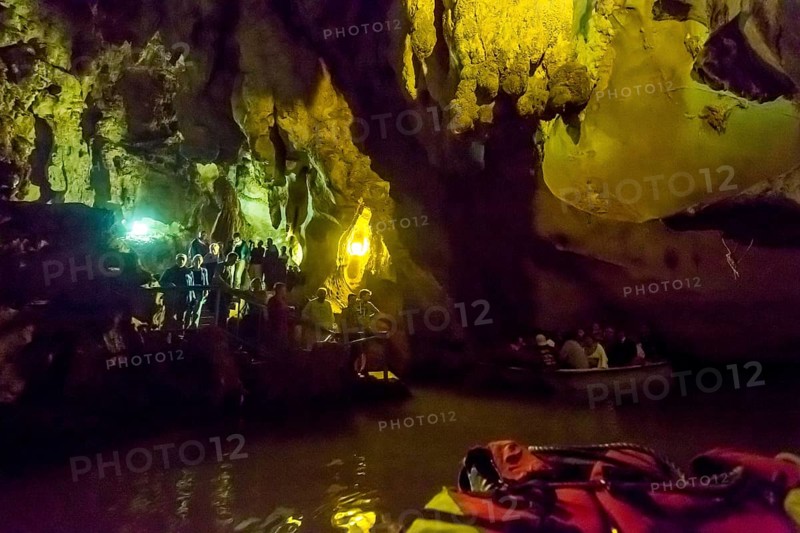 Tourists in a boat on the underground rivers in the caves of the Indios, Cueva del Indio, underground caves with a watercourse river accessible to tourists, Viñales, Cuba, Central America, Cuba, Caribbean